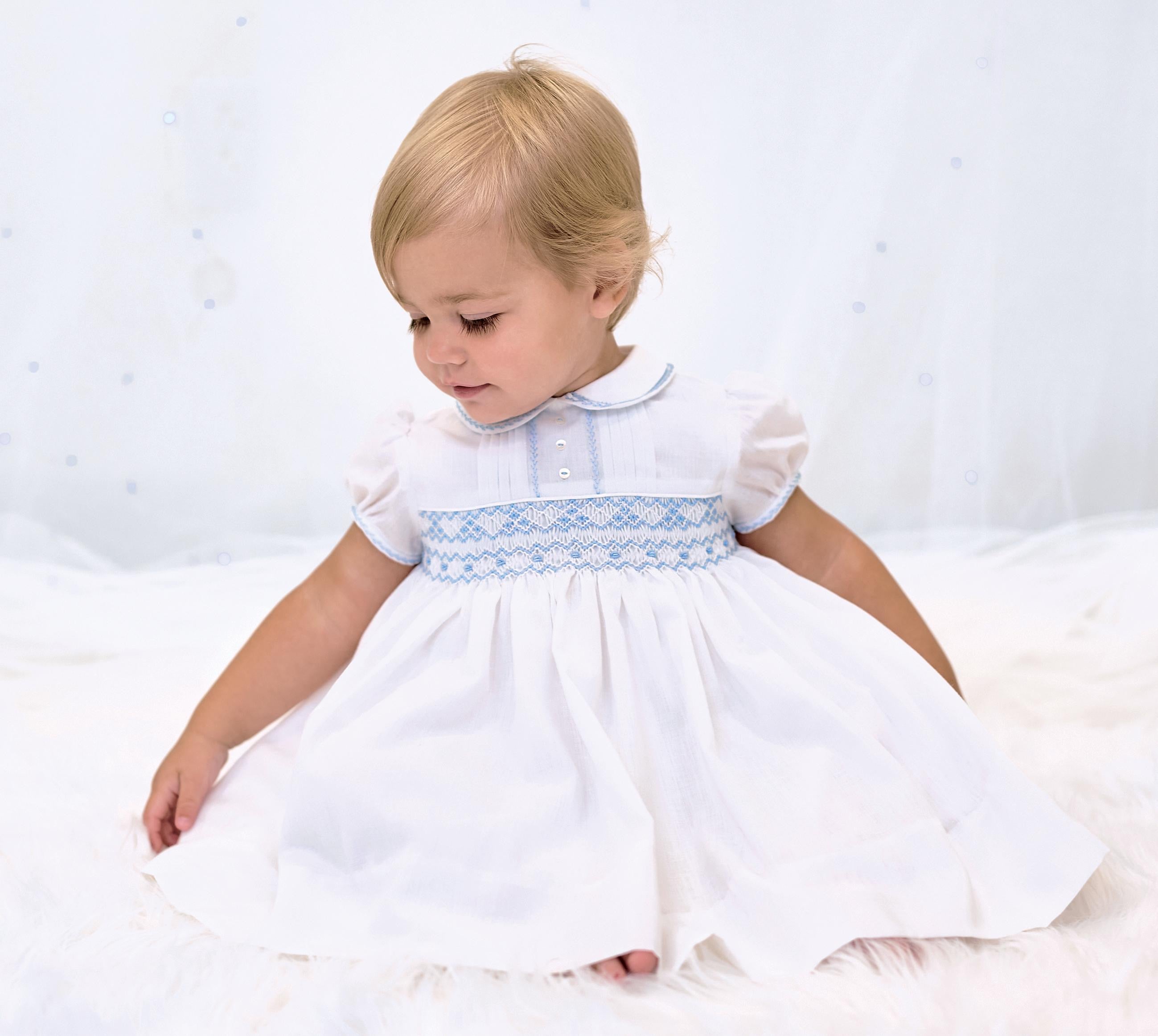 SARAH LOUISE WHITE SMOCKED DRESS